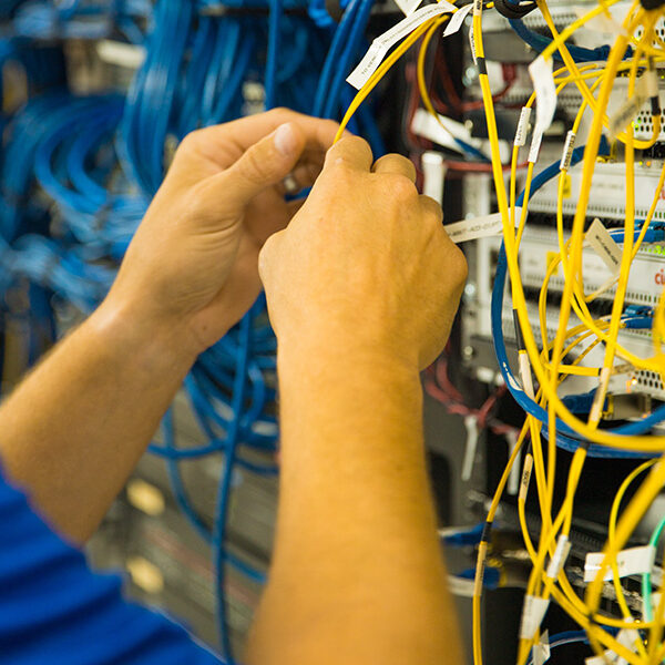 service tech repairing cable