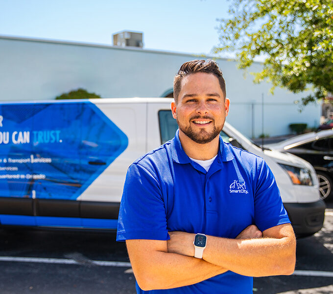 smart city tech in front of van that says Dedicated Fiber Connectivity you can trust