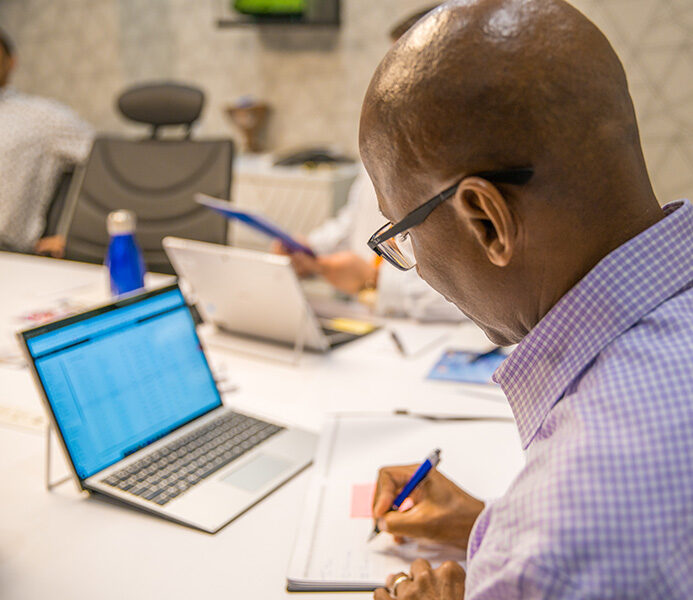 businessman writing notes