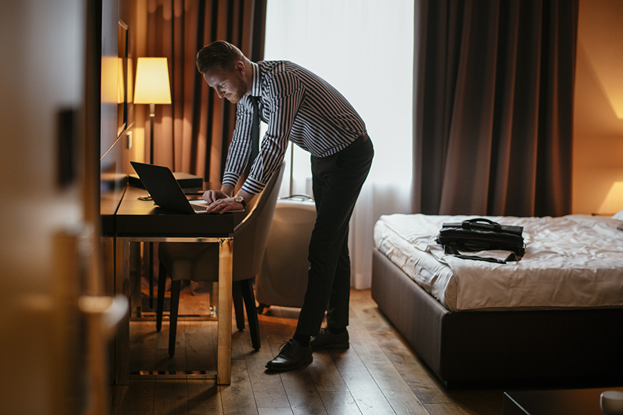 Businessman working from hotel.