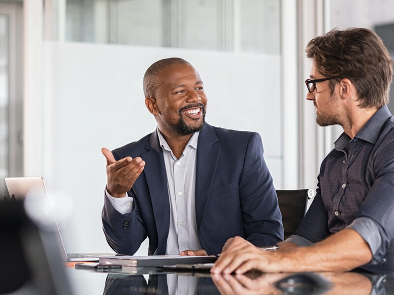 Business Internet - Multiethnic business people in meeting