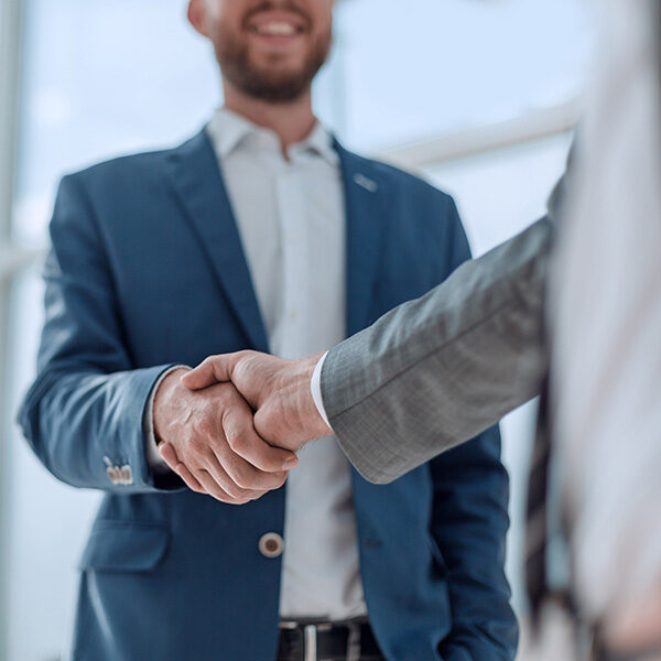 business partners shaking hands . concept of partnership
