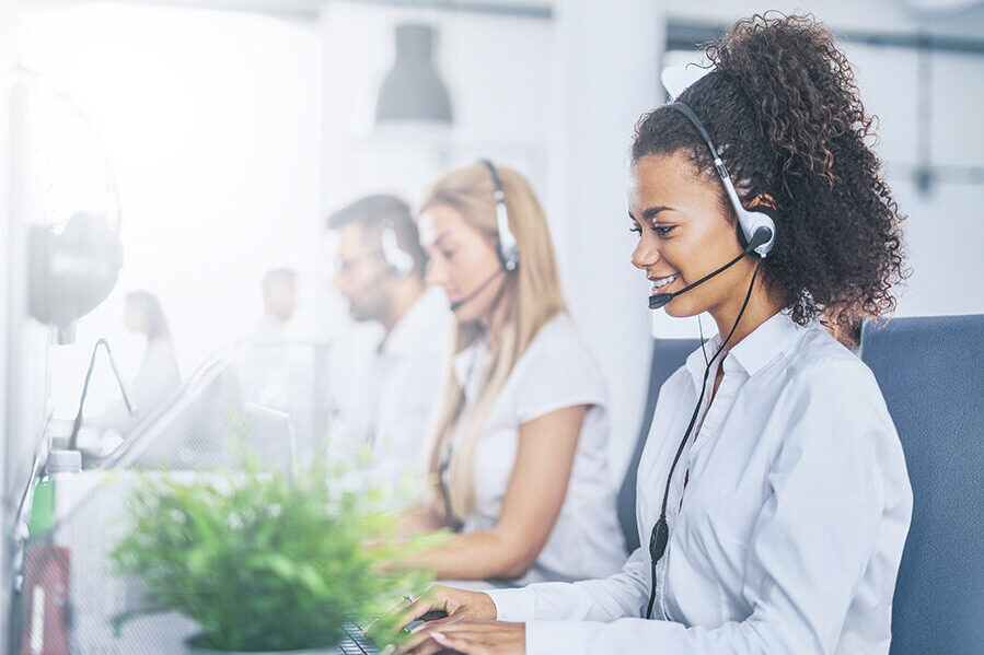 Call center worker accompanied by her team.