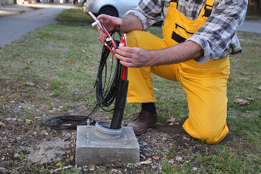 Man working on cables